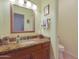 Bathroom with single sink vanity and toilet at 12605 E Kalil Dr, Scottsdale, AZ 85259