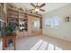 Bedroom with built-in shelves and a murphy bed at 12605 E Kalil Dr, Scottsdale, AZ 85259