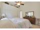 Bright bedroom with a ceiling fan and lots of natural light at 12605 E Kalil Dr, Scottsdale, AZ 85259