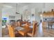 Open concept dining area connecting kitchen and living room at 12605 E Kalil Dr, Scottsdale, AZ 85259