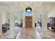 Bright and spacious entryway with high ceilings and wood floors at 12605 E Kalil Dr, Scottsdale, AZ 85259