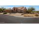 Two-story home with a two-car garage and nicely landscaped yard at 12605 E Kalil Dr, Scottsdale, AZ 85259