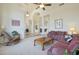 Spacious living room with high ceilings, columns, and views to the dining area at 12605 E Kalil Dr, Scottsdale, AZ 85259