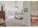 Main bedroom with vaulted ceiling, fireplace, and access to the patio at 12605 E Kalil Dr, Scottsdale, AZ 85259