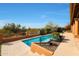 Inviting swimming pool with a large backyard and mountain views at 12605 E Kalil Dr, Scottsdale, AZ 85259