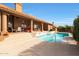 Inviting backyard oasis with a sparkling pool and patio at 12605 E Kalil Dr, Scottsdale, AZ 85259