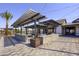 Outdoor kitchen and grilling area with pergola at 13143 N 145Th Ln, Surprise, AZ 85379