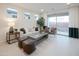 Light and airy living room with sliding glass doors leading to backyard at 13171 N 145Th Ln, Surprise, AZ 85379