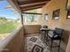 Private balcony with patio furniture and scenic views at 13227 N Mimosa Dr # 117, Fountain Hills, AZ 85268