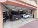 Clean two-car garage with built-in storage and shelving at 13227 N Mimosa Dr # 117, Fountain Hills, AZ 85268