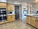 Kitchen with island and walk-in pantry at 13227 N Mimosa Dr # 117, Fountain Hills, AZ 85268