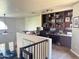 Home office with built-in shelves and a large desk at 13227 N Mimosa Dr # 117, Fountain Hills, AZ 85268