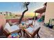 Relaxing patio with seating area and pergola; desert landscape at 13227 N Mimosa Dr # 117, Fountain Hills, AZ 85268