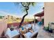 Spacious patio with seating area, fire pit, and mountain views at 13227 N Mimosa Dr # 117, Fountain Hills, AZ 85268