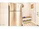 Stainless steel refrigerator in a well-lit kitchen area at 14114 W Smoketree Dr, Surprise, AZ 85387