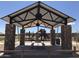 Covered playground area with picnic tables and benches at 14612 W Sand Hills Rd, Surprise, AZ 85387