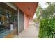 Building exterior with a walkway and lush landscaping at 148 E Coronado Rd # 45, Phoenix, AZ 85004