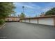 View of parking area with several garages at 148 E Coronado Rd # 45, Phoenix, AZ 85004