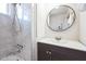 Bathroom with shower/tub and dark vanity at 1531 W Colter St # 7, Phoenix, AZ 85015