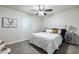 Well-lit bedroom featuring a ceiling fan and comfortable bedding at 1531 W Colter St # 7, Phoenix, AZ 85015