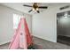 bedroom with playful teepee and neutral decor at 1531 W Colter St # 7, Phoenix, AZ 85015