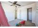 Bright bedroom with ceiling fan and double closets at 1531 W Colter St # 7, Phoenix, AZ 85015