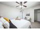 Bedroom with queen bed, ceiling fan, and closet at 1531 W Colter St # 7, Phoenix, AZ 85015