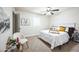 Bright bedroom with a queen-size bed and ceiling fan at 1531 W Colter St # 7, Phoenix, AZ 85015