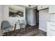 Small dining area with glass table and gray chairs at 1531 W Colter St # 7, Phoenix, AZ 85015