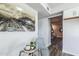 Kitchen corner with glass dining table and artwork at 1531 W Colter St # 7, Phoenix, AZ 85015