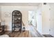 Hallway view with shelving unit and glimpse of dining area at 1531 W Colter St # 7, Phoenix, AZ 85015