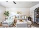 L-shaped sofa, patterned rug, and a modern shelving unit at 1531 W Colter St # 7, Phoenix, AZ 85015