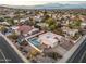 Aerial view of a residential neighborhood showcasing a home with a pool at 15402 N 20Th St, Phoenix, AZ 85022