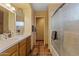 Bathroom with double sinks, shower, and tiled floor at 15402 N 20Th St, Phoenix, AZ 85022