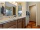 Bathroom with double sinks, shower, and tiled floor at 15402 N 20Th St, Phoenix, AZ 85022