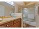 Bathroom with single sink, shower/tub combo, and tiled floor at 15402 N 20Th St, Phoenix, AZ 85022