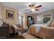 Spacious bedroom with a ceiling fan and plenty of natural light at 15402 N 20Th St, Phoenix, AZ 85022