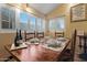 Cozy dining area with wooden table, chairs, and window views at 15402 N 20Th St, Phoenix, AZ 85022