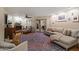 Bright living room featuring a fireplace and access to a patio at 15402 N 20Th St, Phoenix, AZ 85022