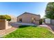 Backyard view showing patio and house exterior at 1710 E Palo Verde St, Gilbert, AZ 85296