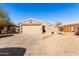 House exterior with driveway and landscaping at 1710 E Palo Verde St, Gilbert, AZ 85296