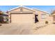 Single-story home with attached garage and desert landscaping at 1710 E Palo Verde St, Gilbert, AZ 85296