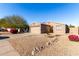 Single-story home with attached garage and landscaped front yard at 1710 E Palo Verde St, Gilbert, AZ 85296