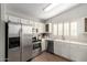 Kitchen with stainless steel appliances and white cabinets at 1710 E Palo Verde St, Gilbert, AZ 85296