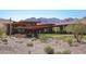 Community center with outdoor entertaining area and mountain views at 18109 W Juniper Dr, Goodyear, AZ 85338