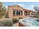 Spacious hot tub located near the home's exterior at 18109 W Juniper Dr, Goodyear, AZ 85338