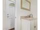 Simple bathroom with vanity and a view of the entryway at 1815 N Dayton St, Phoenix, AZ 85006