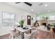 Bright dining area with marble table and four chairs, near the living room at 1815 N Dayton St, Phoenix, AZ 85006