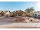 Charming brick home with a renovated front porch and well-maintained landscaping at 1815 N Dayton St, Phoenix, AZ 85006