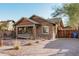 Recently updated brick home with a spacious front yard and driveway at 1815 N Dayton St, Phoenix, AZ 85006